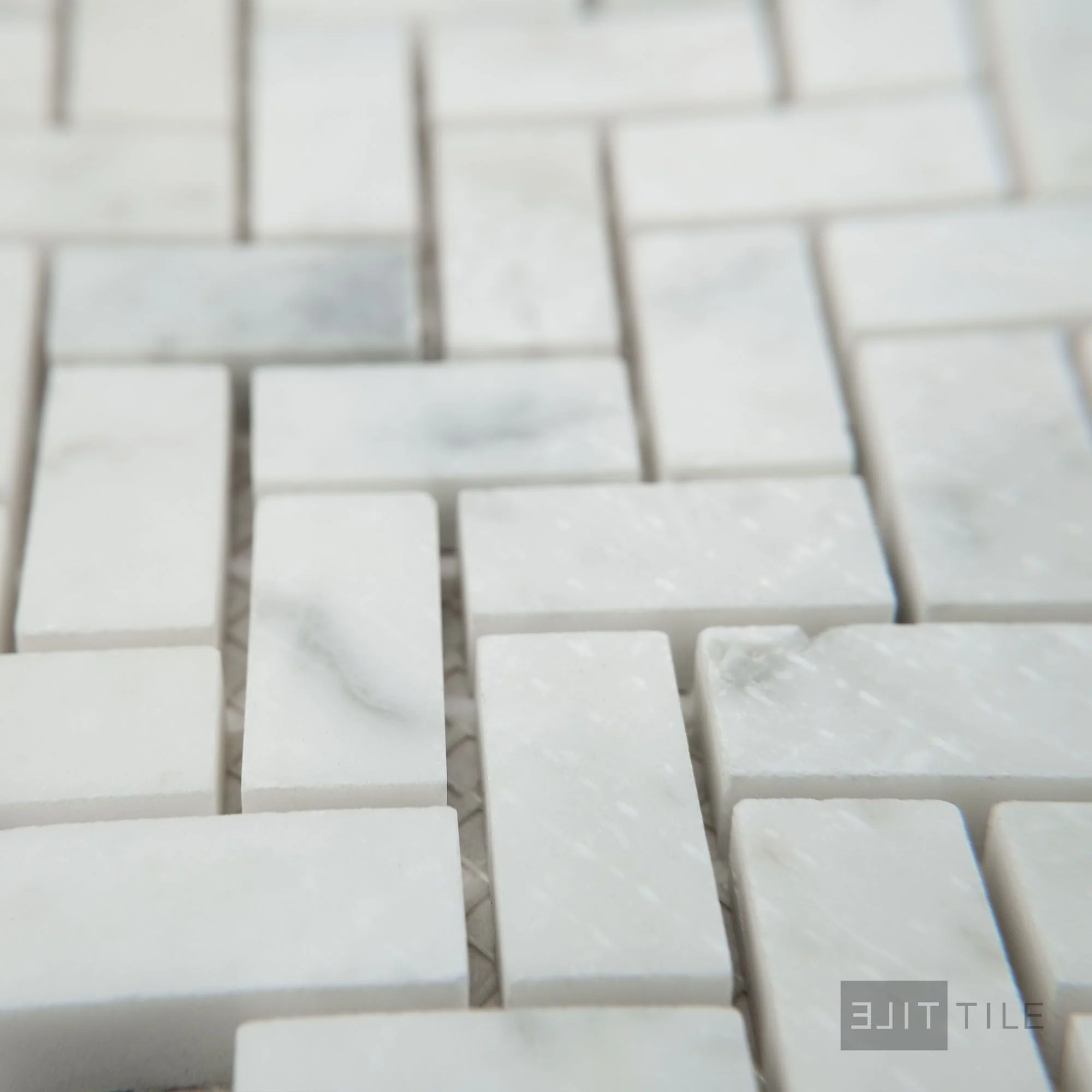 White Carrara Marble 5/8X1-1/4 Herringbone Honed Mosaic - Image 3