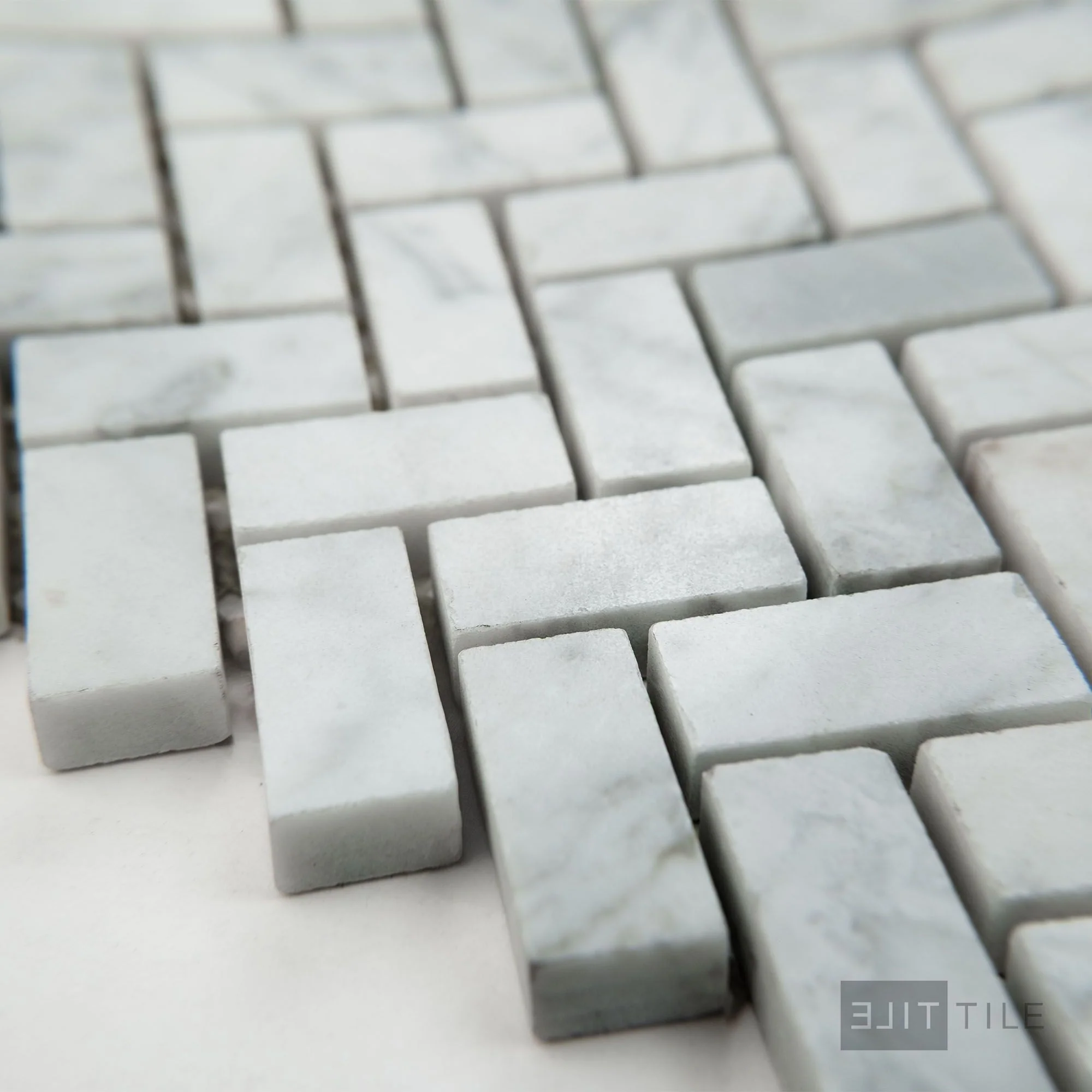 White Carrara Marble 5/8X1-1/4 Herringbone Polished Mosaic - Image 3